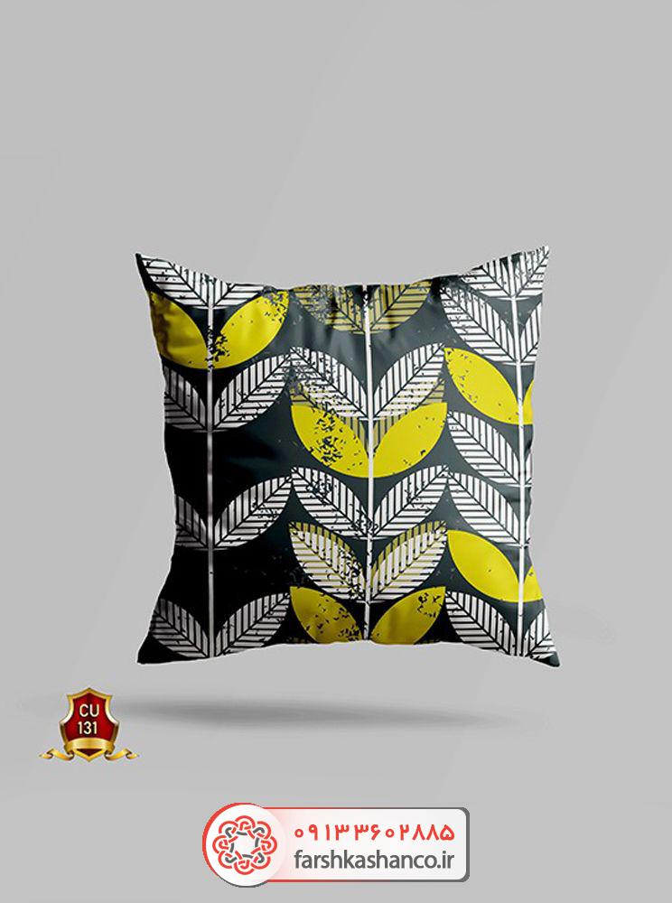 کوسن طرح برگ های فانتزی با زمینه تیره کوسن طرح برگ های فانتزی با زمینه تیره